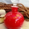 Antigua y preciosa botella esférica de cristal rojo. Años 30