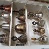 Campanillas. Colección de 14 campanillas en vitrina de madera. Maravillosas.