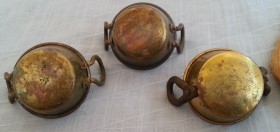 Cazos de cobre en miniatura.