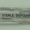 Escalpelo. Bisturí precintado moderno.