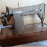 Antigua máquina de coser marca Singer. A manubrio.