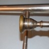 Trombón valvular del año 1928. ESTUCHE ORIGINAL.