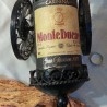 Botellero muy curioso metálico con botella de vino Monte Ducay. Año 1970