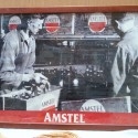 Cartel publicitario AMSTEL. Acristalado y enmarcado.