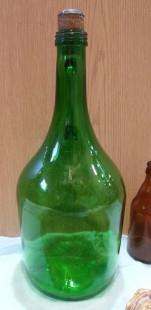 Garrafa de vidrio verde. Damajuana. Años 70