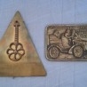 Placas automovilísticas de grandes premios. En bronce