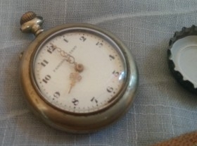 Reloj antiguo de bolsillo. Marca Famoso Patent.