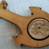 Barómetro con termómetro. Años 70. Forma de ancla. En madera y vidrio.