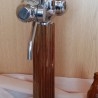 Columna Cervecera. Marca Lison. Bronce blanco con remates en madera.