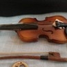 Violín. Miniatura. Con su funda original.