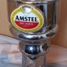 Grifo de cerveza en bronce blanco. Marca Amstel.