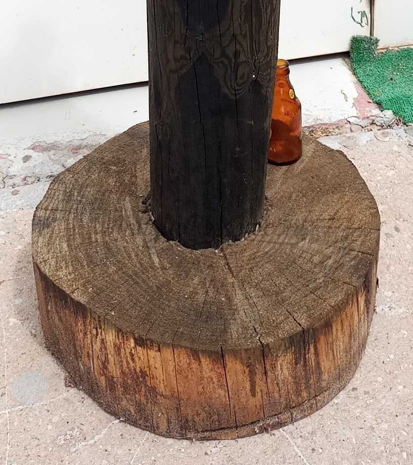 Yunque de Zapatero sobre base de madera.